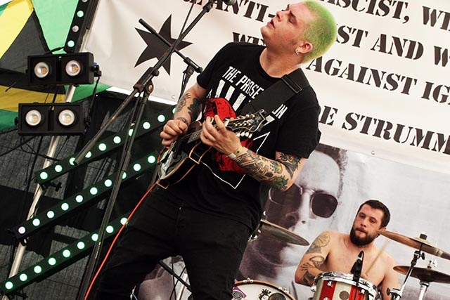 Mattie Humphries (green hair) and drummer John Dempsey from Roughneck Riot
