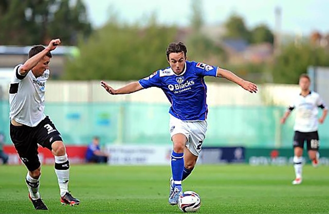 BACK AT BOUNDARY PARK: Jose Baxter in action for Athletic in 2013