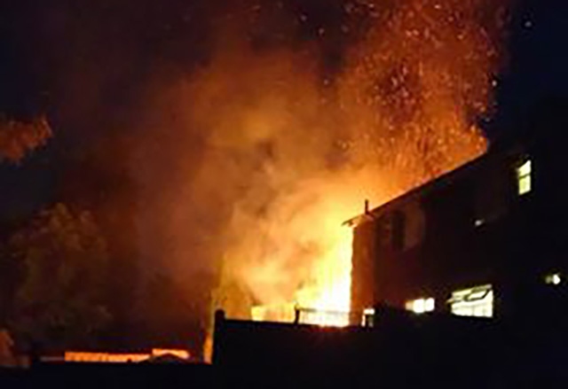 The house fire at the rear of Bromley Avenue in Royton last night.
Picture courtesy of Michael Crompton The house fire at the rear of Bromley Avenue in Royton last night.
Picture courtesy of Michael Crompton