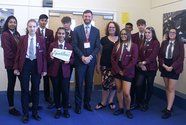 MP Jim McMahon with pupils at Hathershaw College