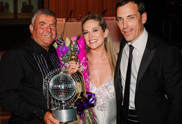 Liam Kiely (left) with his professional partner Cara Tighe and United Utilities Chief Operating Officer Steve Fraser