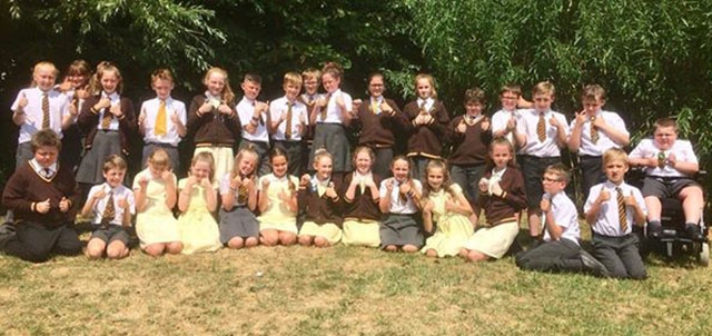 St Josephs' Year Six pupils with their Blue Peter badges