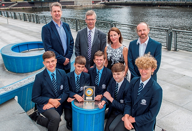 Saddleworth School students with their Clean Air Day competition winners’ award and (back, left-to-right) Mark Matthews of Collaborate Digital, TfGM Customer Director Stephen Rhodes, Saddleworth School Community and Operations Manager Angela Reece and Head of Media Studies Nik Jackson