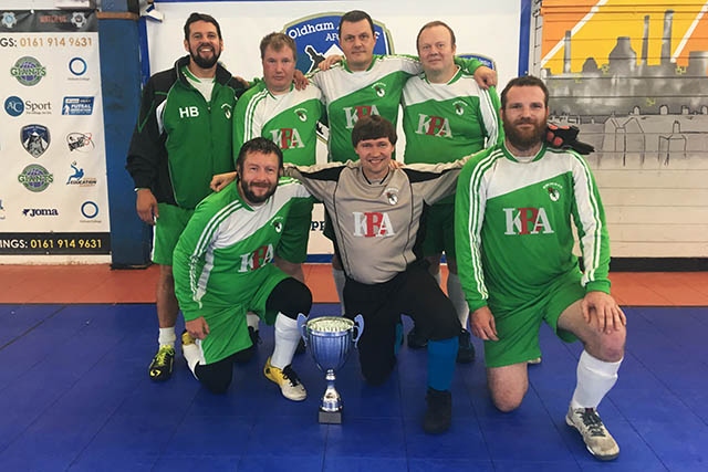 The jubilant Emmaus Mossley team celebrate their futsal victory