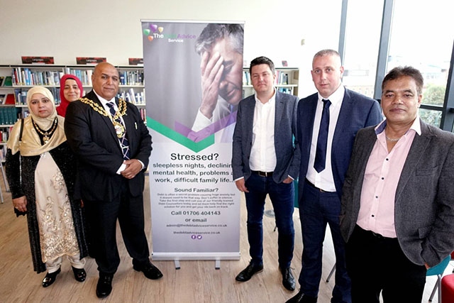 Pictured at the Debt Advice Service launch are Mayor of Oldham Javid Iqbal and the Mayoress. Behind the mayoress is Subnum Hariff-Khan. Pictured (right) are Kirk and Aaron from the Debt Advice Service and Cllr Abdul Malik (far right)