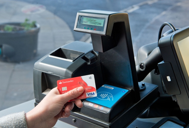 A new contactless machine on a First bus