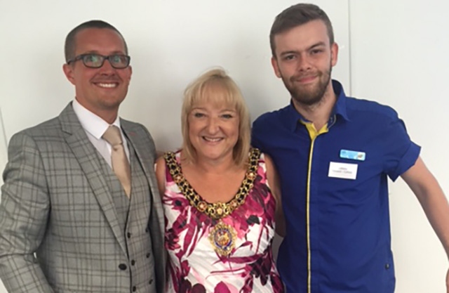 Oldham's Anthony Howard-Cofield is pictured (right) with Lord Mayor of Manchester, Councillor June Hitchen, and Greg Bate, from Seetec 