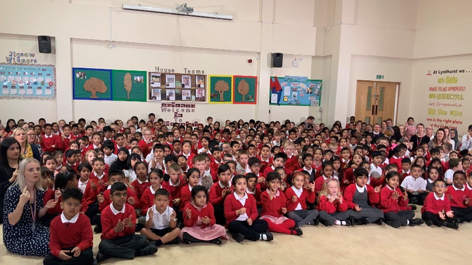 Pupils at Lyndhurst Primary School use sign language Pupils at Lyndhurst Primary School use sign language