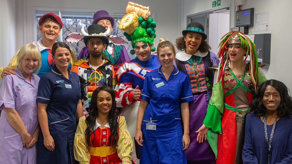 The cast of Jack and the Beanstalk with staff at Dr Kershaw's Hospice