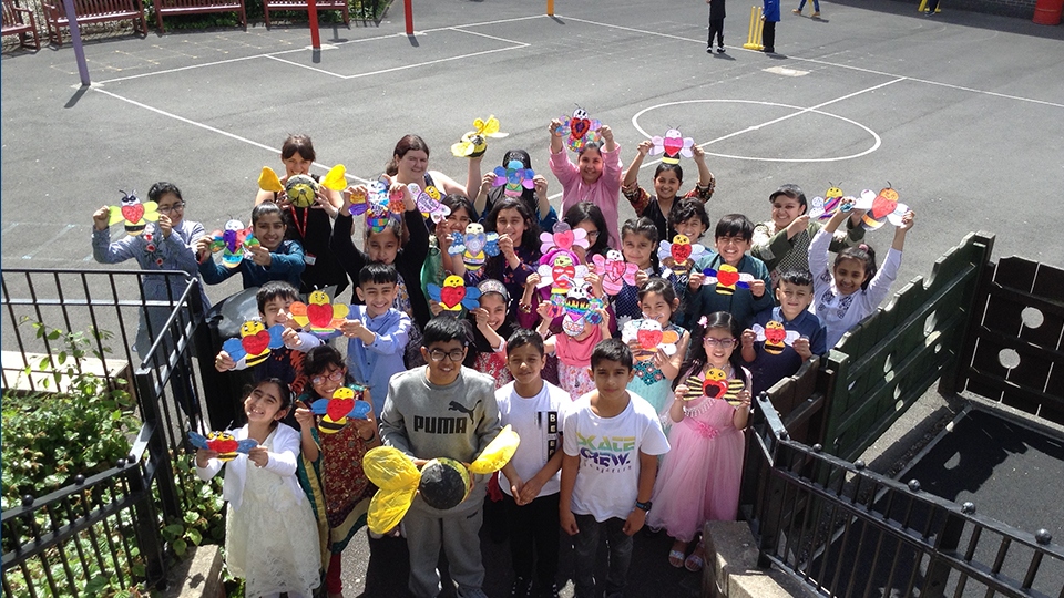 Pupils at Alexandra Park School with some of their 'Bee' Peace work models