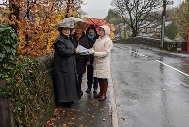 Pictured are Cllr Pam Byrne (left) with Rachel Bird, Penny Sankey and Jayne Gibson, all Dobcross Road Safety Group volunteers