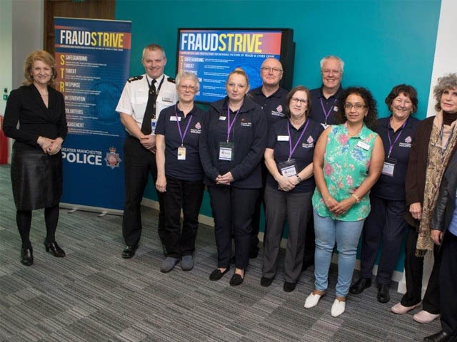 Dep. Chief Constable Ian Pilling and Dep. Mayor Bev Hughes meet Senior Scam Busters Dep. Chief Constable Ian Pilling and Dep. Mayor Bev Hughes meet Senior Scam Busters