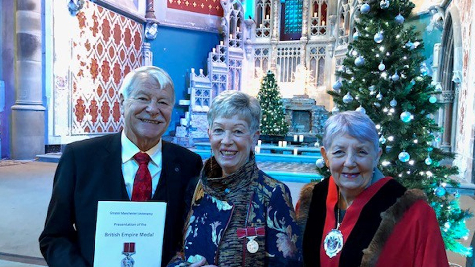 Jennifer Greenwood, centre, with Her husband Chris and Oldham’s deputy mayor, Cllr Jenny Harrison, pictured at the BEM ceremony. Jennifer Greenwood, centre, with Her husband Chris and Oldham’s deputy mayor, Cllr Jenny Harrison, pictured at the BEM ceremony.