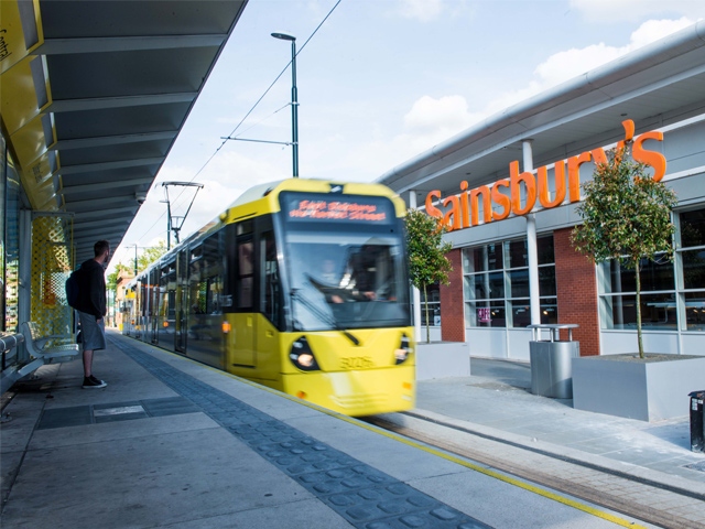 The tram stop by Sainsbury's in Oldham