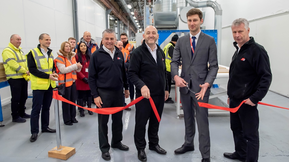Oldham Council Leader Cllr Sean Fielding, centre, visiting HPP in early 2019 when he opened a new vinyl-wrapped door production line. He is pictured with, from left, Richard Mottram, Keith Wardrope and Stephen Hill, all from HPP.