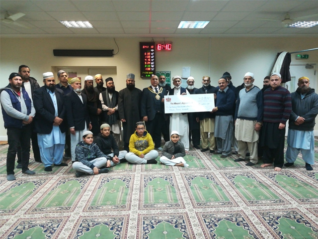 The Bilal Jamia Mosque, Clarksfield, handed the money over on Tuesday The Bilal Jamia Mosque, Clarksfield, handed the money over on Tuesday