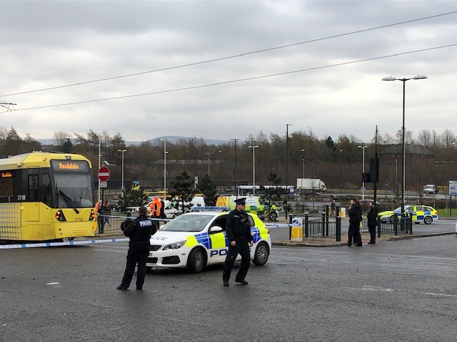 Police at the scene of Oldham Mumps, where a woman was hit by a tram on Wednesday.