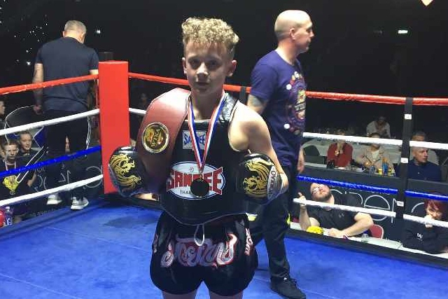 Anthony Hamer with his boxing belt