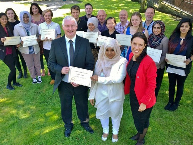 Tahmina, along with the other participants of a previous summer school, being awarded their ‘graduation’ certificates by special guest Bryn Hughes, father of the late PC Nicola Hughes, and Debbie Tahmina, along with the other participants of a previous summer school, being awarded their ‘graduation’ certificates by special guest Bryn Hughes, father of the late PC Nicola Hughes, and Debbie