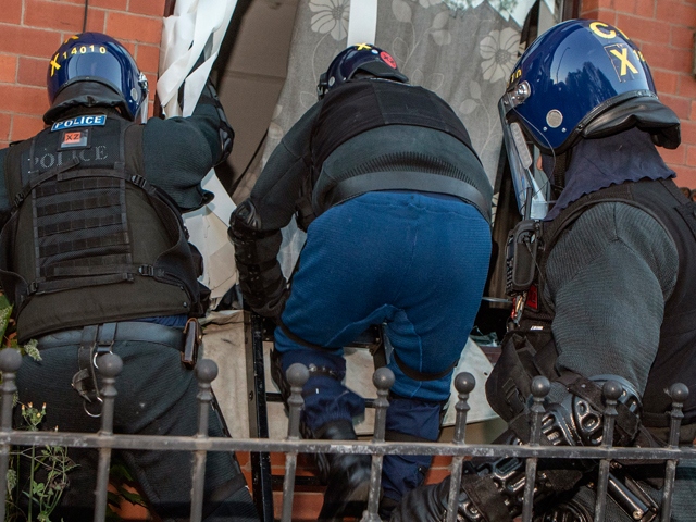 Credit: GMP - Warrants were executed across Oldham this morning Credit: GMP - Warrants were executed across Oldham this morning