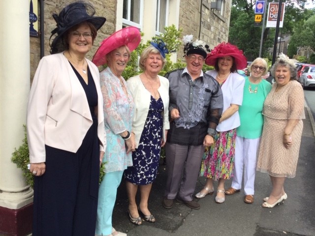L-R: Joan McLean, Cllr Pat Lord, Sylvia Curley, John Tomlinson, Cllr Pam Byrne, Alma McInnes, Betty Tomlinson (organiser) at The Old Bell, Delph. It was an Ascot Ladies Day lunch with horse racing. Think they were raising funds for Macmillan with  any profits.

