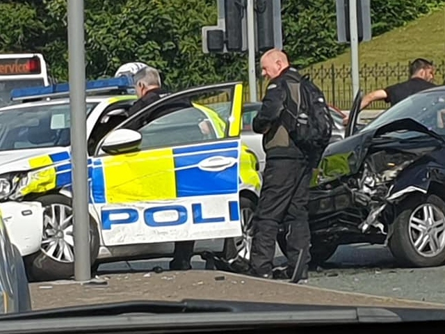 The crash near Rochdale Police Station