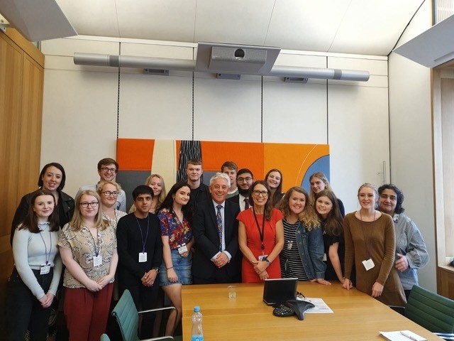 Debbie’s summer school participants with John Bercow - left to right - Eleonore, Caitlin, Jenna, Vicky, George, Aman, Aisling, Lisa, Tom, John, Archie, Zeshan, Debbie, Freya, Emily, Katie, Libby, Megan, Marzia.