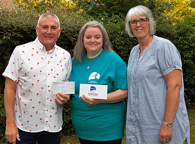 Sarah Fitchett, from Papyrus, receives a cheque from Musical Friends' Paul Osbaldiston and Jayne Collins Sarah Fitchett, from Papyrus, receives a cheque from Musical Friends' Paul Osbaldiston and Jayne Collins