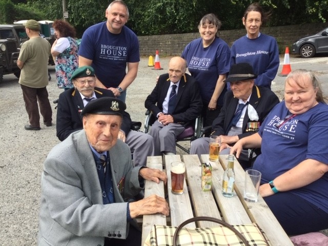 Day out for the veterans (back row): Royal Marine Commando George Sims, D-Day veteran, Paul and Sue Greenlees from Broughton House behind Ron Berry (Royal Navy), then carer Gaynor Anderson, who is behind Ken Ashworth (Royal Artillery), another D-Day veteran, April Jolly, carer and activities coordinator.