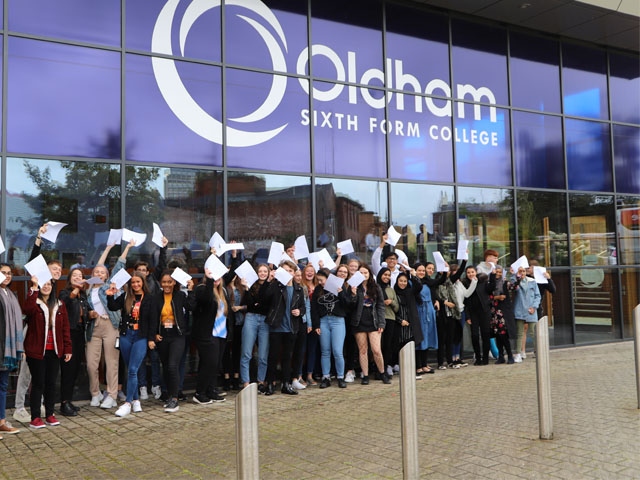 Students celebrating their results Students celebrating their results