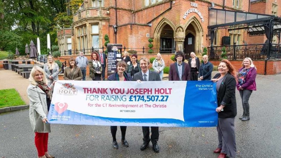 Members of The Christie charity and some of the Joseph Holt team Members of The Christie charity and some of the Joseph Holt team