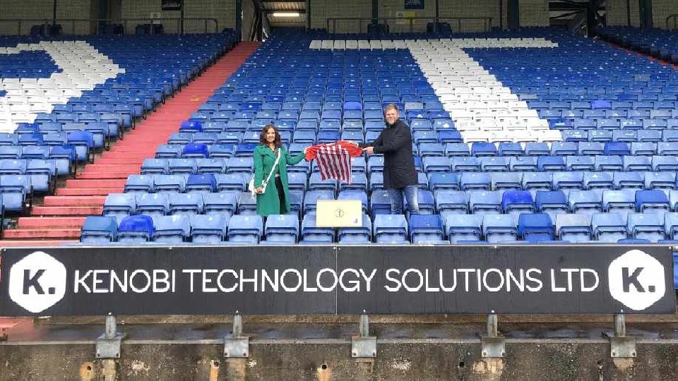 Competition winner Sam Corry receiving her prizes from Managing Director of Kenobi Technology Solutions, Glen Taylor Competition winner Sam Corry receiving her prizes from Managing Director of Kenobi Technology Solutions, Glen Taylor