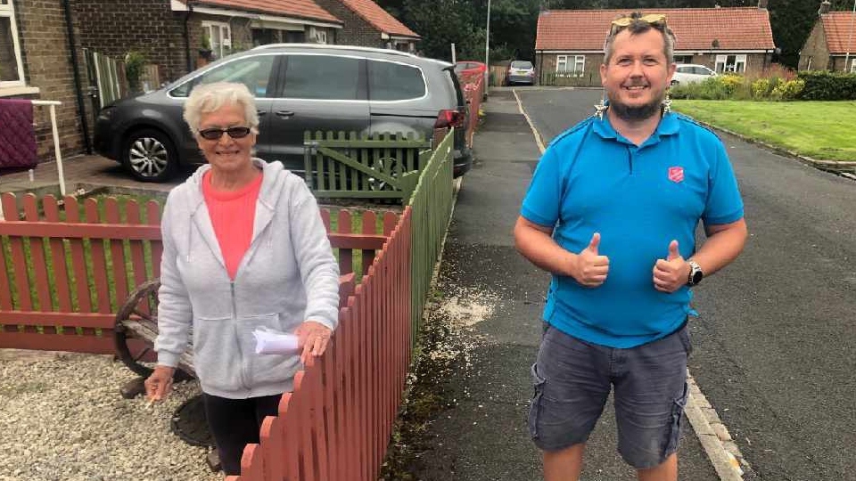 Resident Hilda Moffett (left) with Graham Rogers from the Salvation Army during a singo bingo session