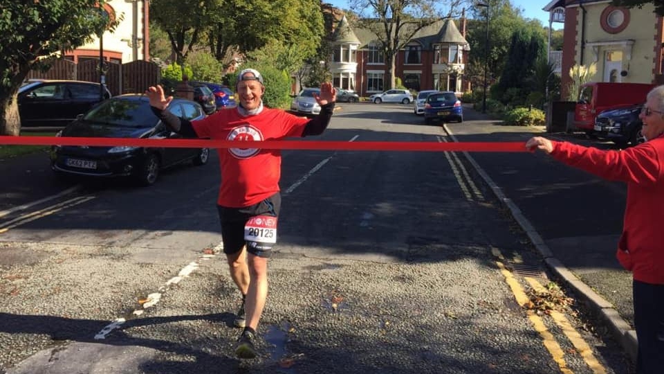 Steve Hill pictured crossing the line close to the bottom of Buckstones Road in Shaw yesterday