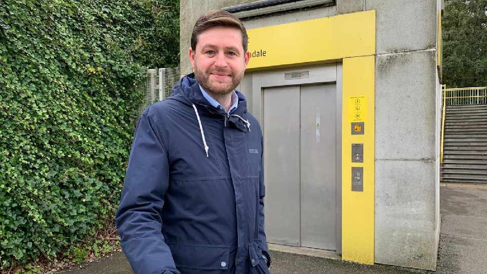 MP JIm McMahon is pictured at the Freehold tram stop