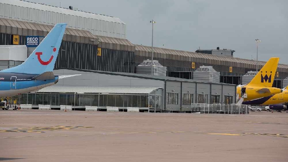 The man became abusive when attempting to leave the flight from Tenerife to Manchester airport on Friday The man became abusive when attempting to leave the flight from Tenerife to Manchester airport on Friday
