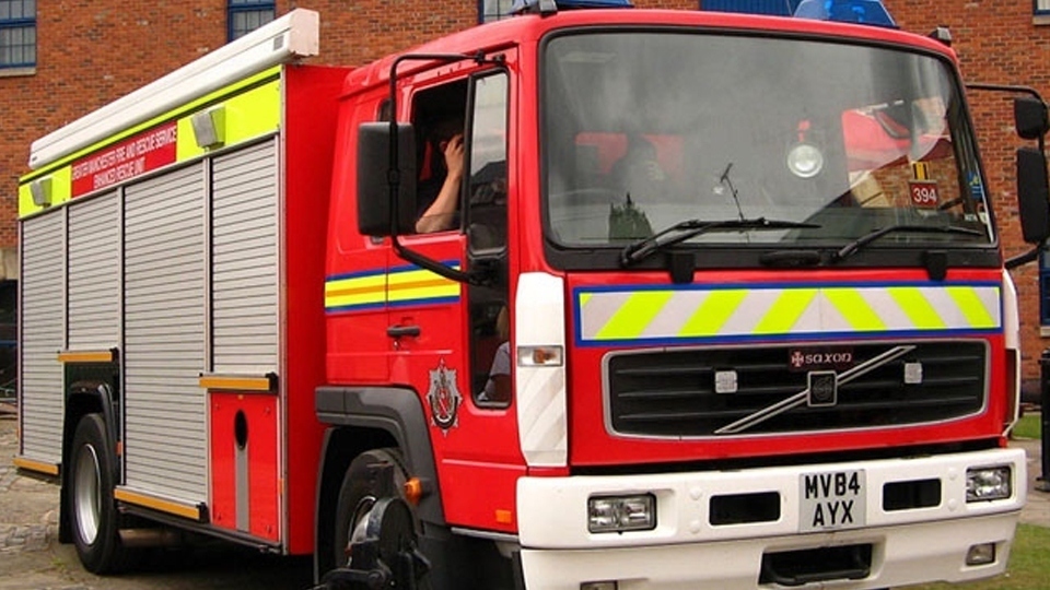 Crews were faced with a fire believed to be caused by a blocked flue in a log burner