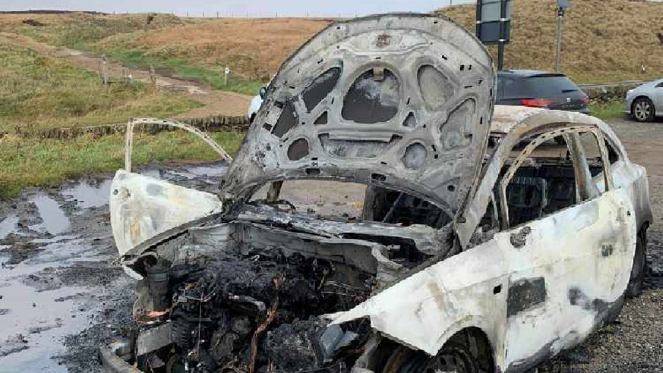 The fire-ravaged car The fire-ravaged car