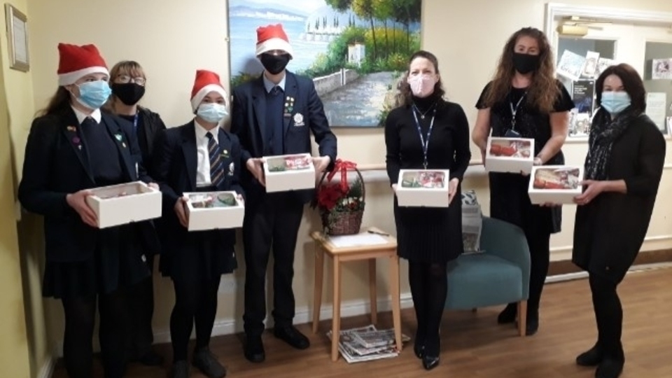 Students and staff from Saddleworth School with their treats for residents of Riverside House