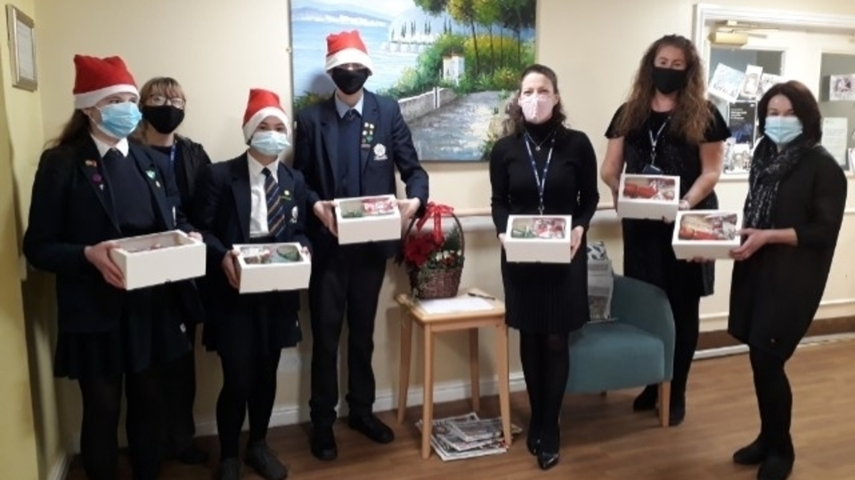Students and staff from Saddleworth School with their treats for residents of Riverside House Students and staff from Saddleworth School with their treats for residents of Riverside House