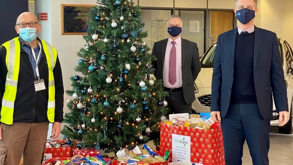 OMC dealership staff in Oldham with some of the foodbank donations