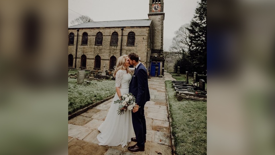 Loving embrace outside a HolyTrinity Church, Dobcross (Danielle Boxall Photography) Loving embrace outside a HolyTrinity Church, Dobcross (Danielle Boxall Photography)