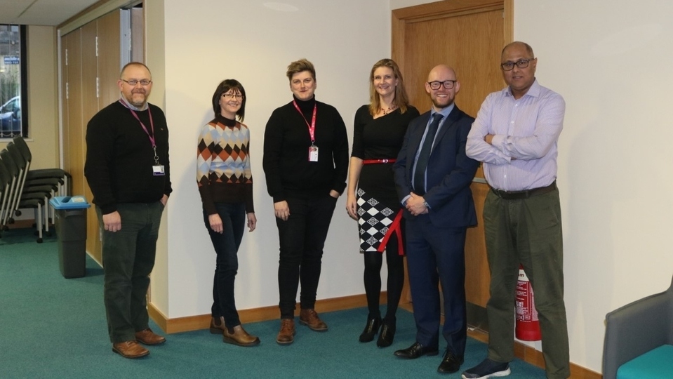 The Oldham project team are pictured (pre-pandemic) The Oldham project team are pictured (pre-pandemic)