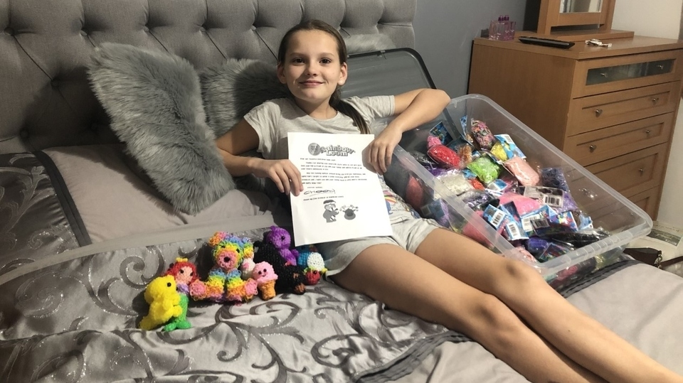 Holly Lloyd shows off her letter from Choon Ng Holly Lloyd shows off her letter from Choon Ng