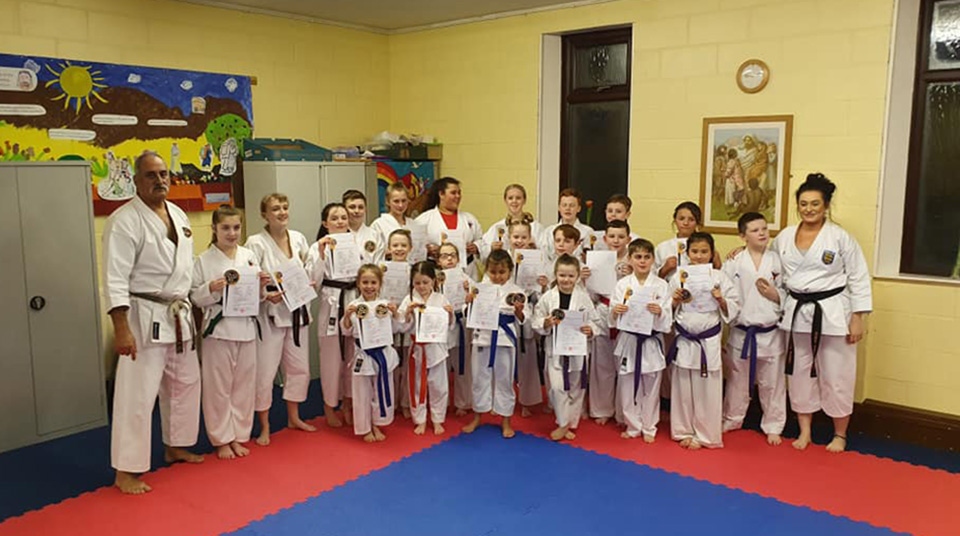 The successful Kenny Karate students are pictured with their certificates