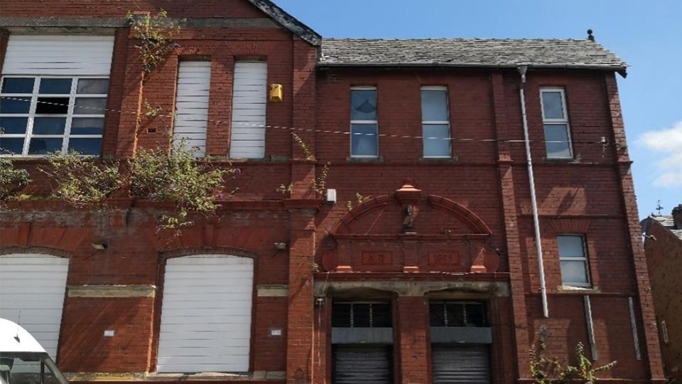 A former Conservative club and shops in Oldham will be transformed into shared houses, with up to 18 people living in one building.