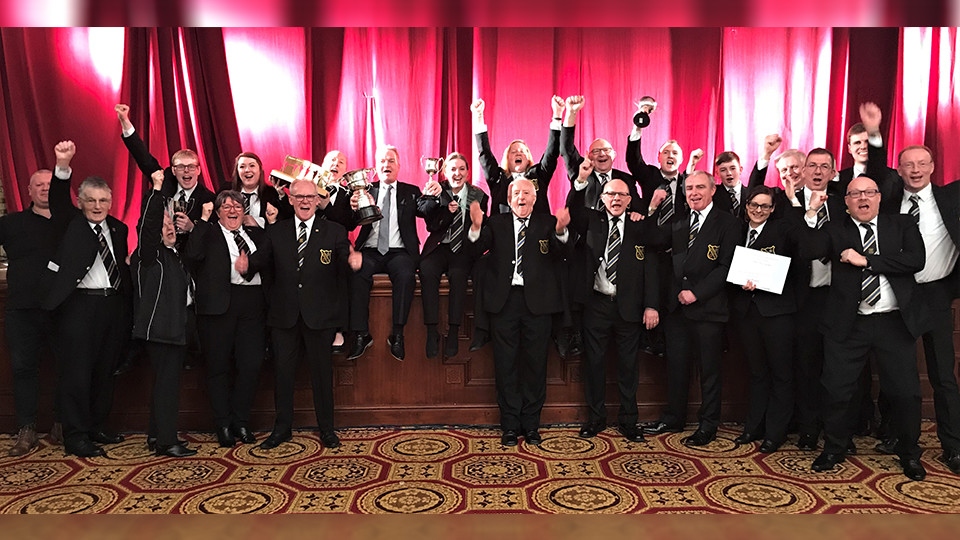 Dean Redfern receiving the trophies from adjudicators and representative from Kapitol Promotions Dean Redfern receiving the trophies from adjudicators and representative from Kapitol Promotions