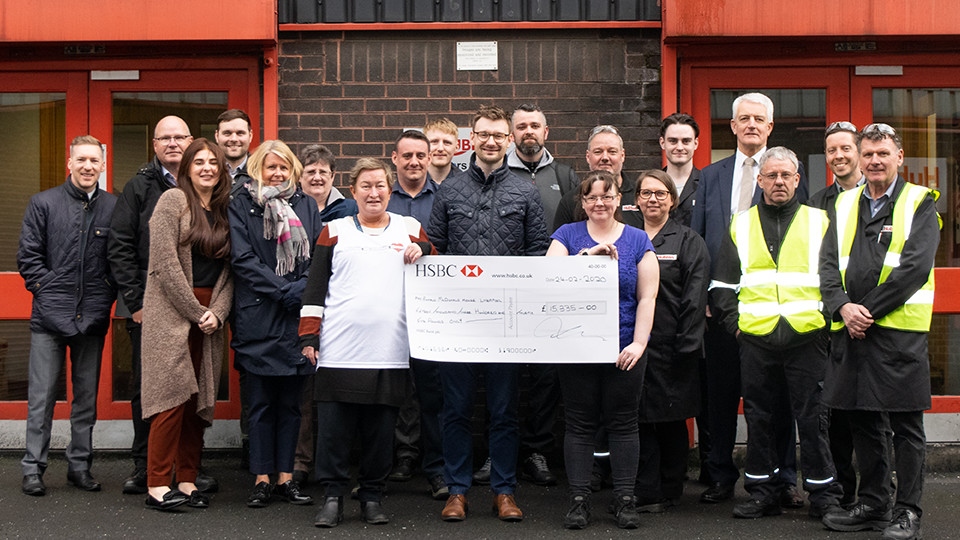 Staff at Hubron raised £15,000 for McHouse in Liverpool