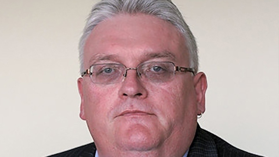 Leader of the Liberal Democrats in Oldham, Cllr Howard Sykes
