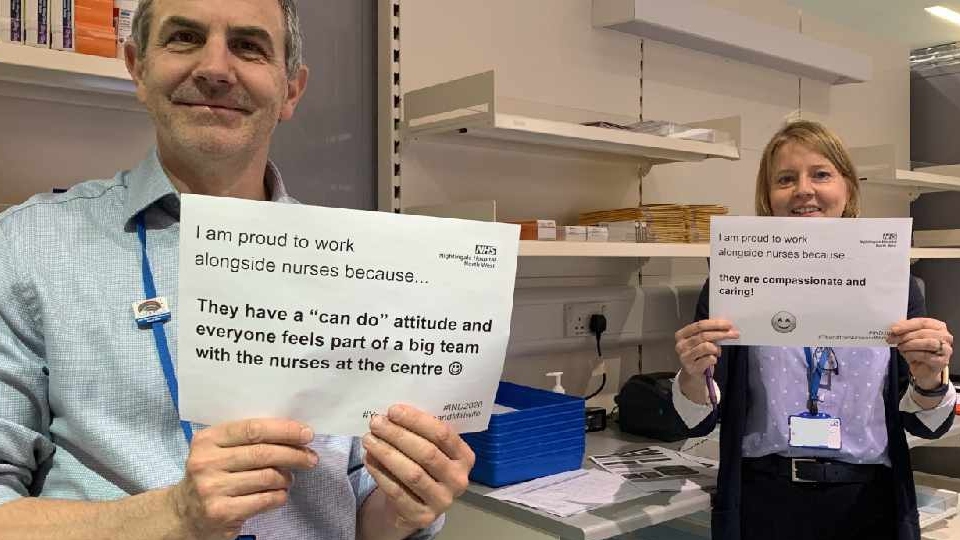 Pharmacists Andrew Gitsham and Angela Sawyer show their appreciation for nursing colleagues on International Nurses Day